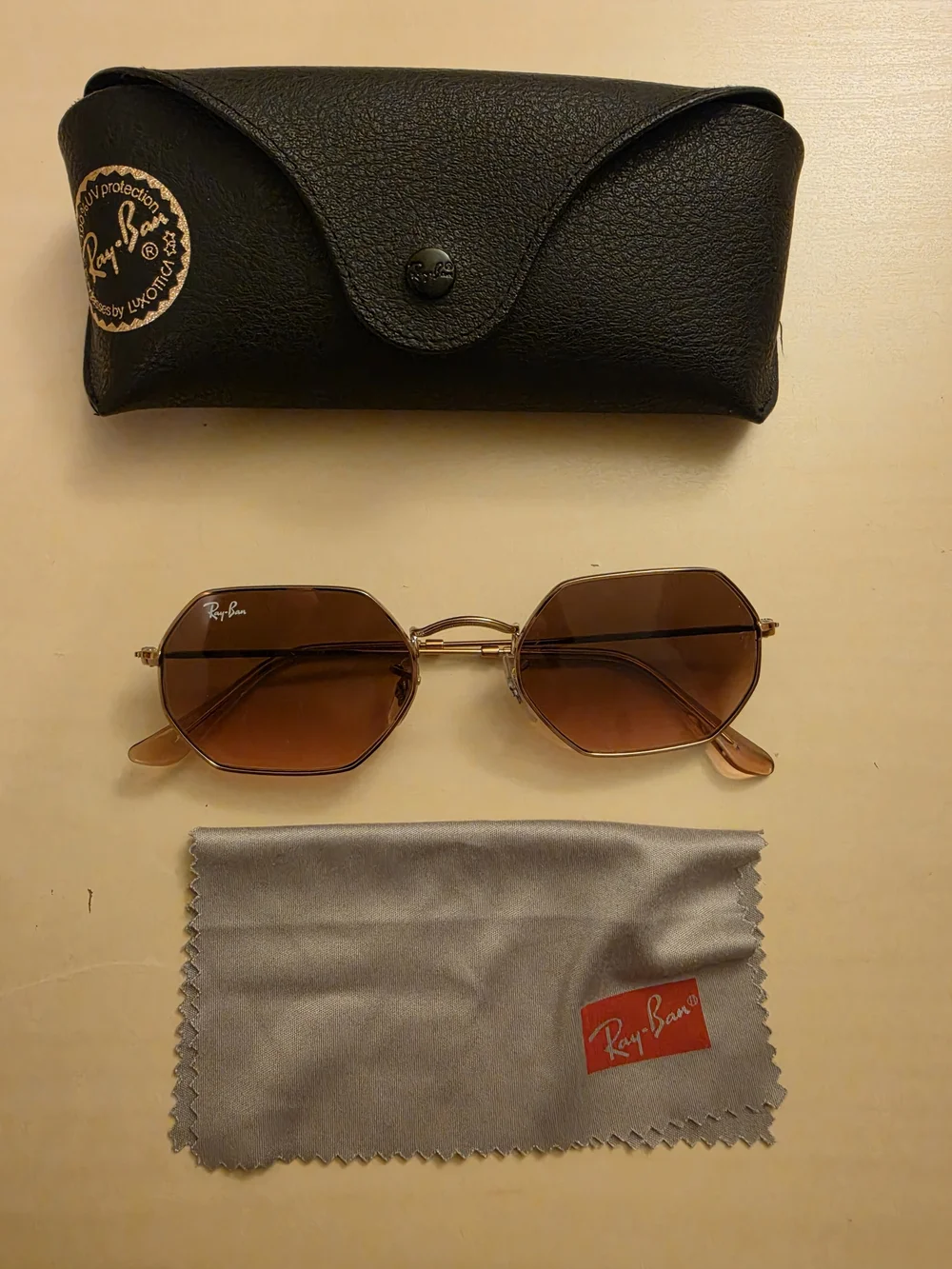 Ray-Ban Women’s Brown Lensed Gold Frame Octagon Sunglasses